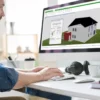 Man-works-with-3d-house-planner-home